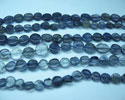 Iolite coin shape beads from orissa gems.com